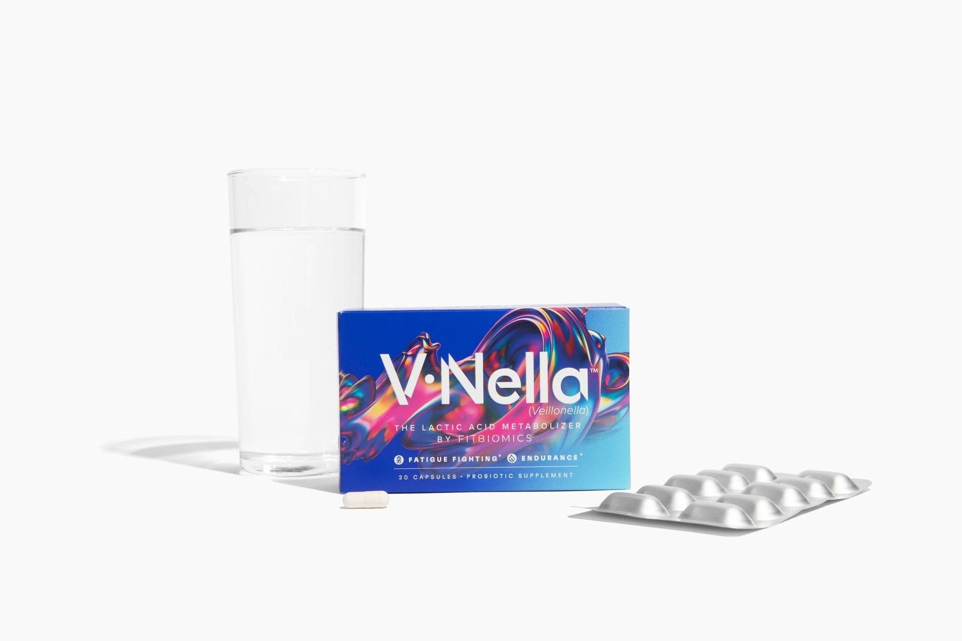 v•nella with blister card and glass of water